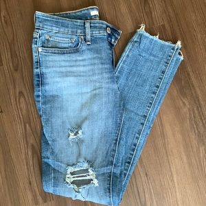 Levi’s 711 Distressed Skinny Jeans.